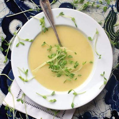 This vegan Potato Leek Soup is so rich and creamy, it's hard to believe how nourishing it is too! The ingredients are simple, but the flavor is divine. Serve it warm in the winter & spring, or eat it chilled in the summer when temps start to rise.