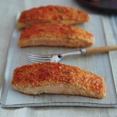You'll LOVE this quick and easy recipe for Sticky Sesame Salmon w/ Orange Sauce. Serve it w/ rice or quinoa and veggies for a healthy dinner everyone will love!