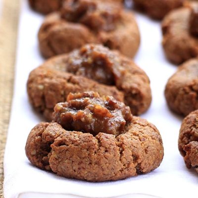 gluten free gingerbread cookies with caramel filling on a white napkin