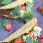 I promise you won't miss the meat with these AMAZING Crunchy Lentil Tacos with Avocado Feta Guacamole. Serve them Taco Bar Style w/ all the fixins' for a Meatless Monday meal EVERYONE will devour! | Vegetarian & gluten-free.