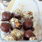 Glass bowl filled with pumpkin energy bites.