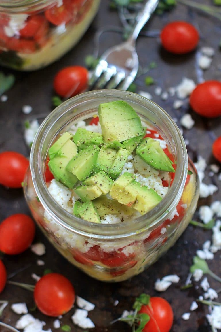 Genius Healthy Breakfast Hack! Scrambled Eggs in a Jar w/ Avocado, Pesto, Feta Cheese, and Sugar Plum Tomatoes | Recipe, at The Spicy RD, is gluten free, low carb, vegetarian, w/ a low FODMAP option. Delicious for lunch or dinner too!