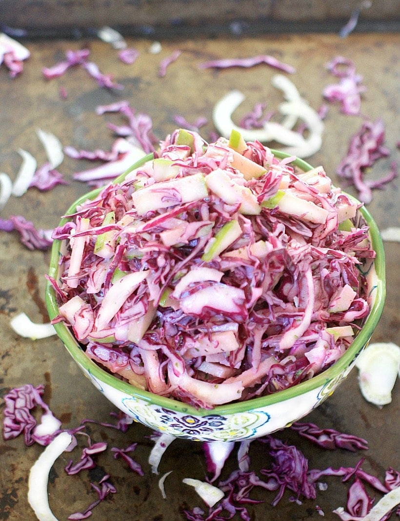 You'll love this Fennel, Apple and Red Cabbage Slaw tossed with Creamy Maple Lemon Tarragon Dressing. It's gluten free, low carb, and packed with nutrients. Enjoy it alone, with pulled pork, or on a ham sandwich~any way you eat it, it's delicious!