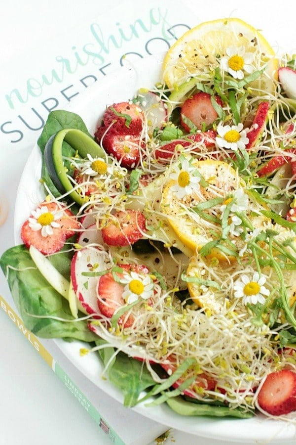 This Superfood Salad Bowl with spinach, strawberries, zucchini, radishes, and honey-miso dressing, is like summer in a bowl! It's naturally gluten-free, vegetarian, and paleo, with easy low FODMAP and vegan options. #glutenfree #superfood #salad #bowl #lowfodmap #vegan #healthyrecipes