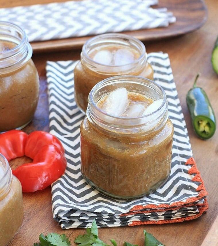 vegetable juice in jars, jalapeno, and bell pepper.