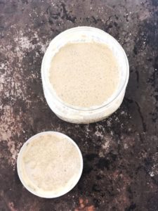 Thickened coconut chia pudding in a mason jar.