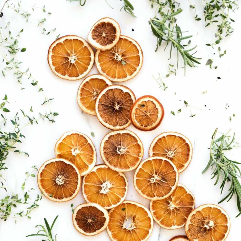 improve digestion naturally- oranges and fresh herbs.