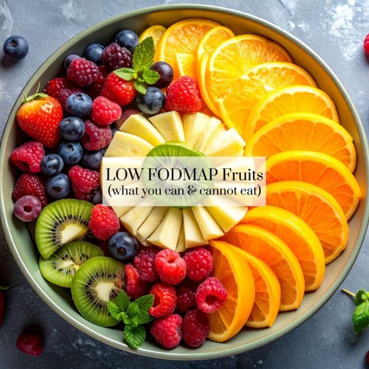 Bowl of low FODMAP fruit including oranges, blueberries, and kiwifruit.