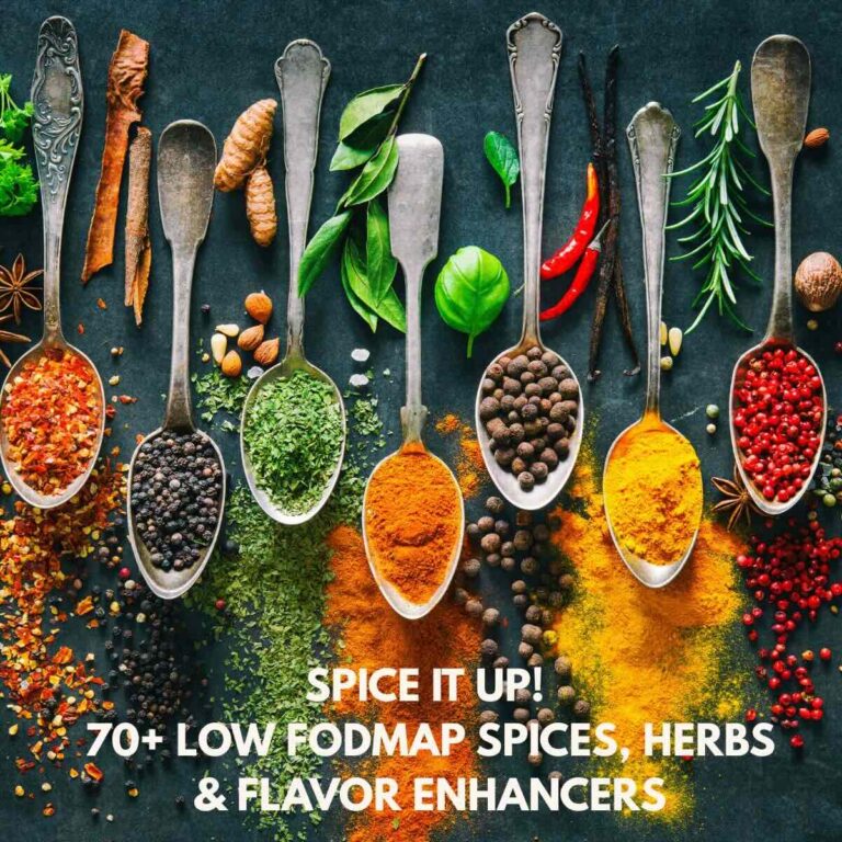Multicolored spices on spoons, fresh herbs, and chili peppers on a black background.