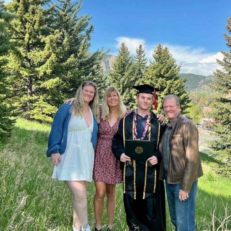 Family of four graduation photo in Colorado.